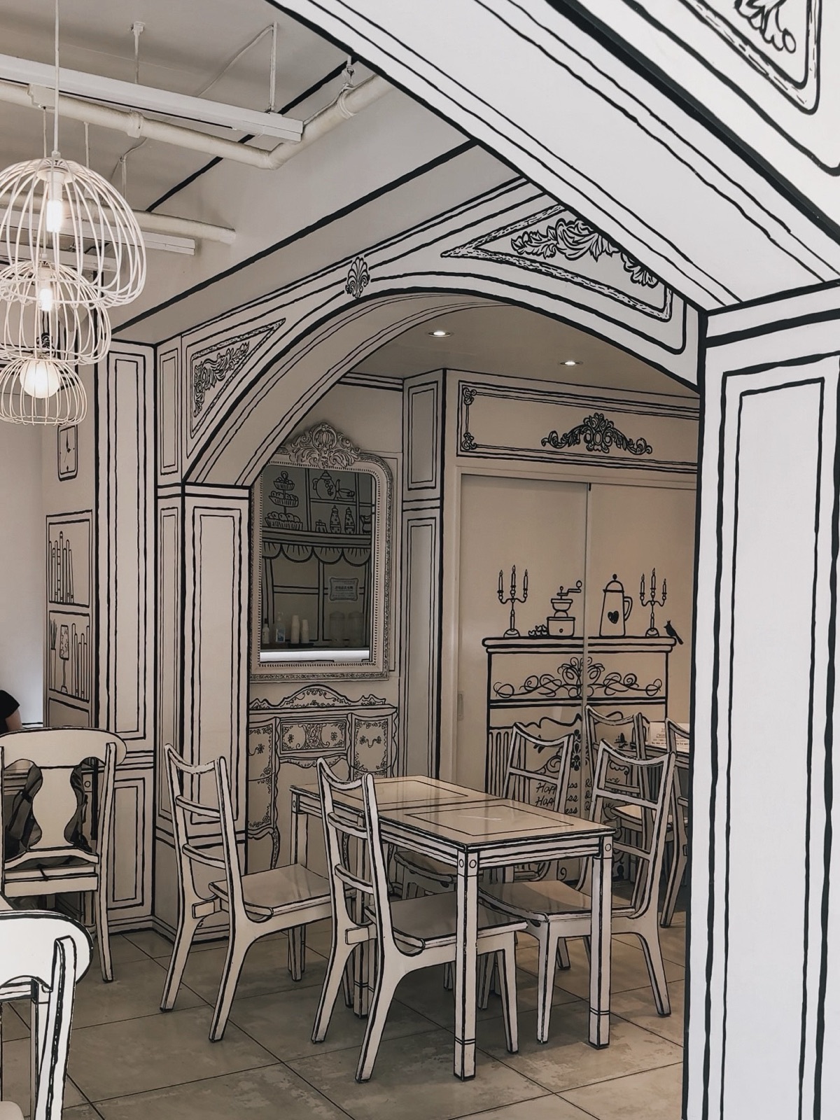 2D Café a Tokyo, locale a tema fumetto con pareti e piatti in stile bidimensionale